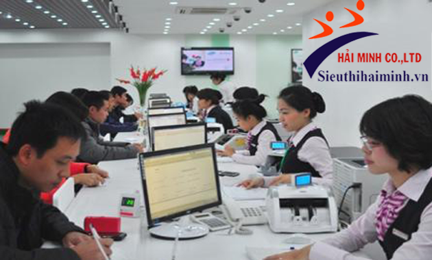 Máy đếm tiền xinda trong ngân hàng