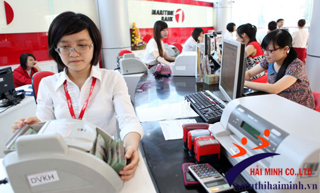 máy đếm tiền xinda trong ngân hàng